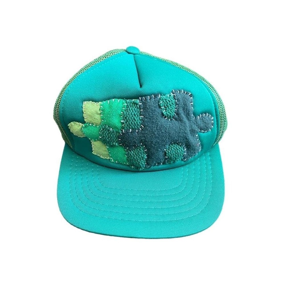 Hand sewn puzzle trucker hat